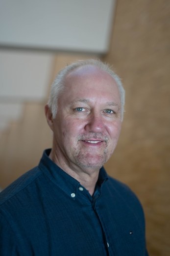 Dr. André C. Dennes